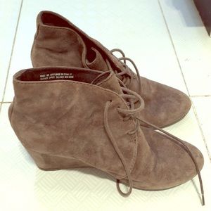 Gray heeled lace up boots